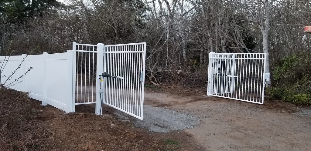 Rolling chain link driveway gate installed on a Humboldt County property