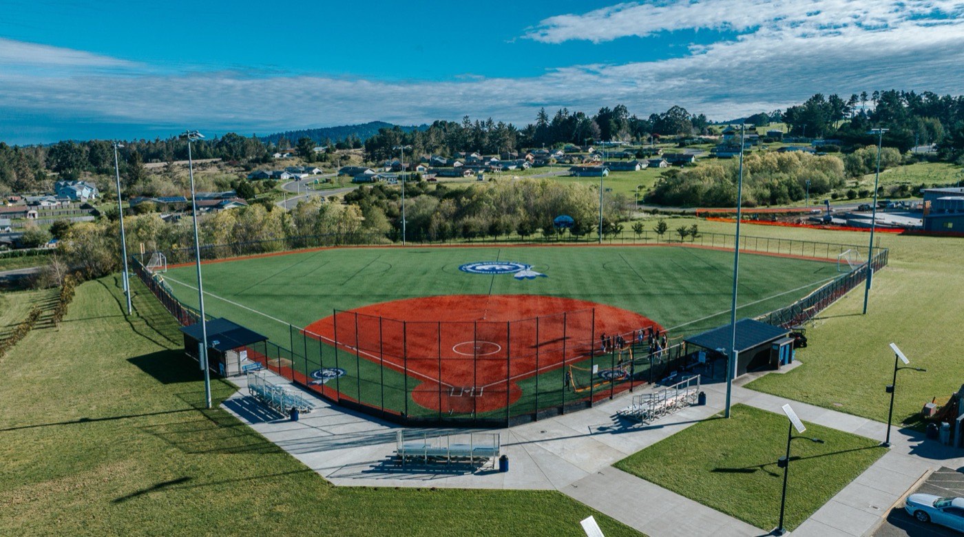 Aerial view of a baseball field with Humboldt Fence-installed chain link backstop and outfield perimeter, Humboldt County, CA