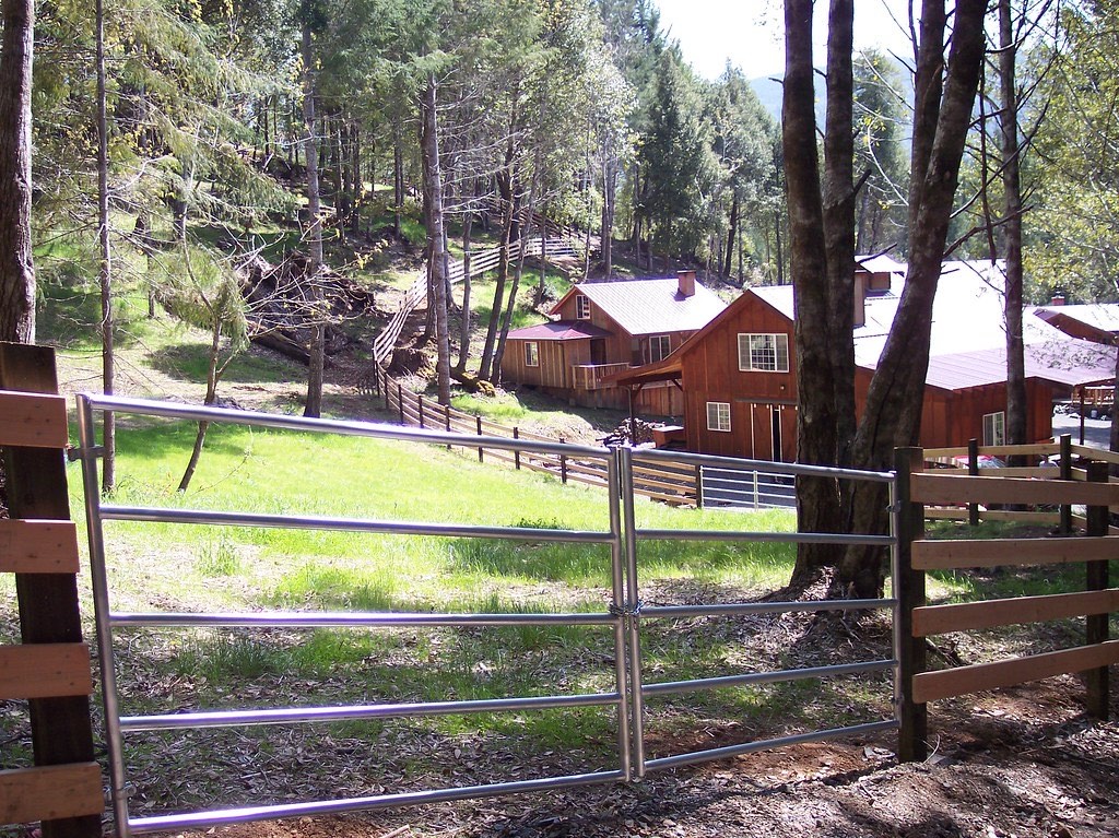 Custom hillside specialty fence installation following a steep Humboldt grade