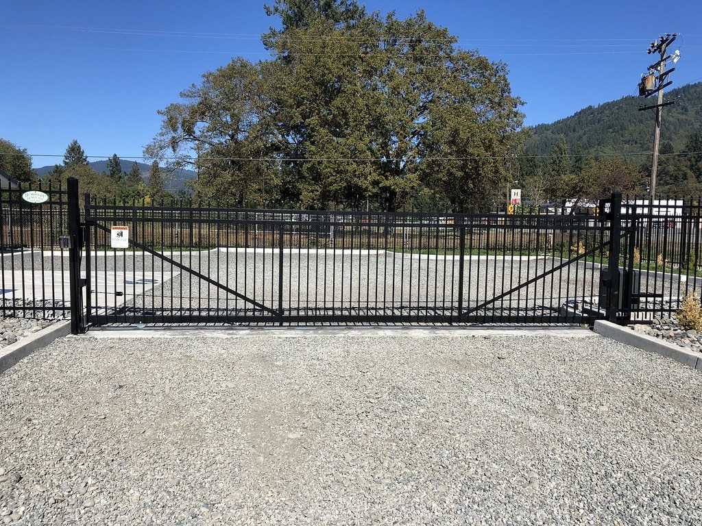 Custom gate and fence combination designed for an unusual Humboldt County property
