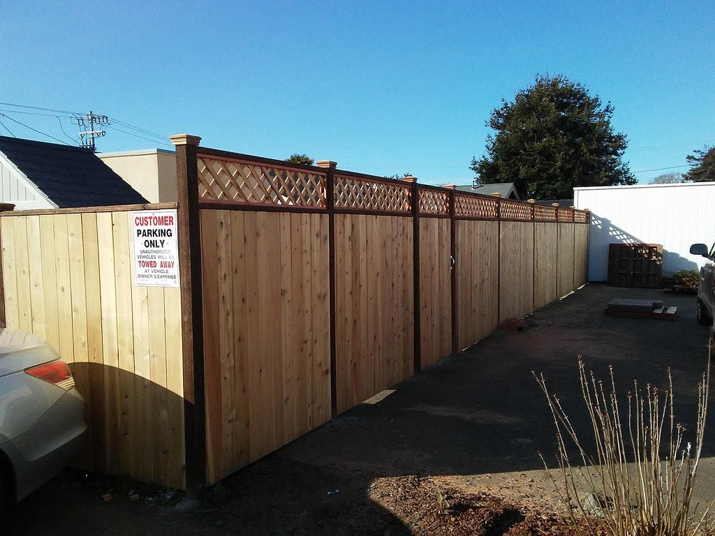 Example of board-on-board redwood privacy fence with lattice top, built for a Humboldt County home